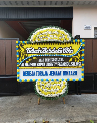 Papan Bunga Duka di Idanogawo